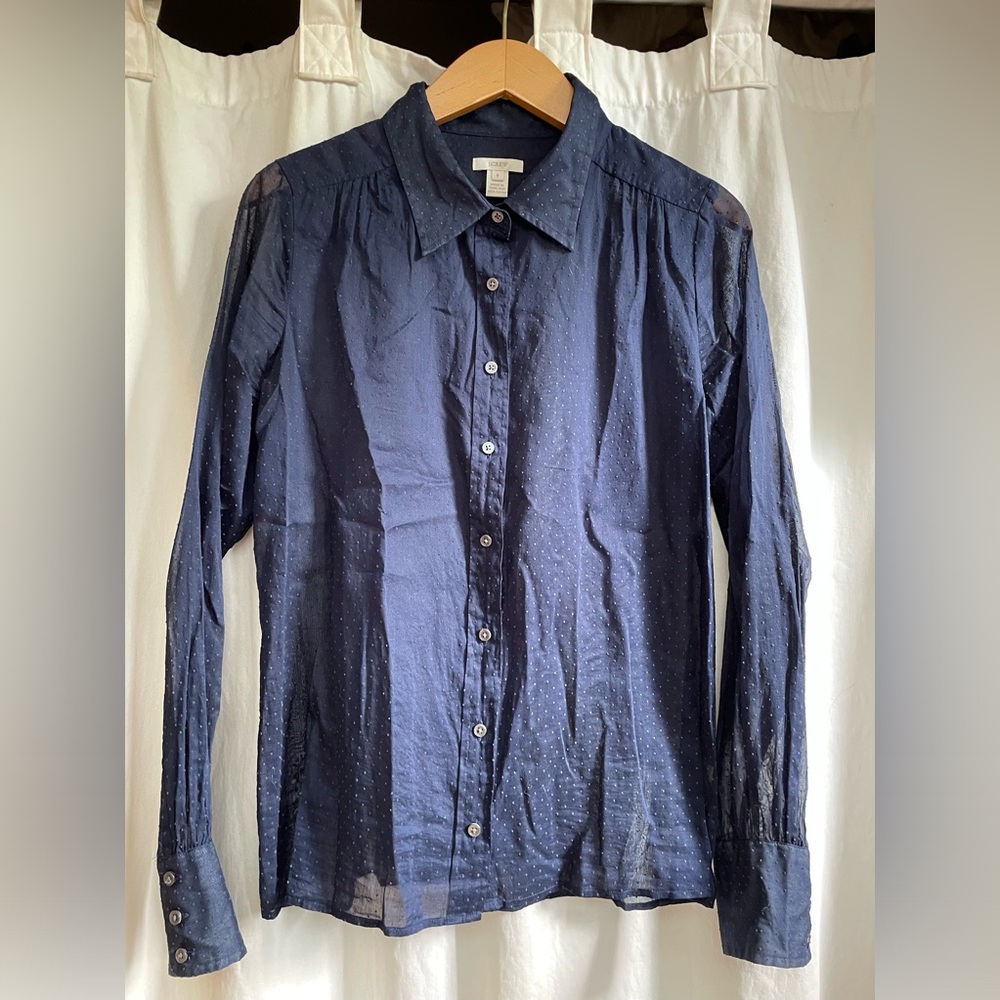 See thru dark navy button down dress shirt.